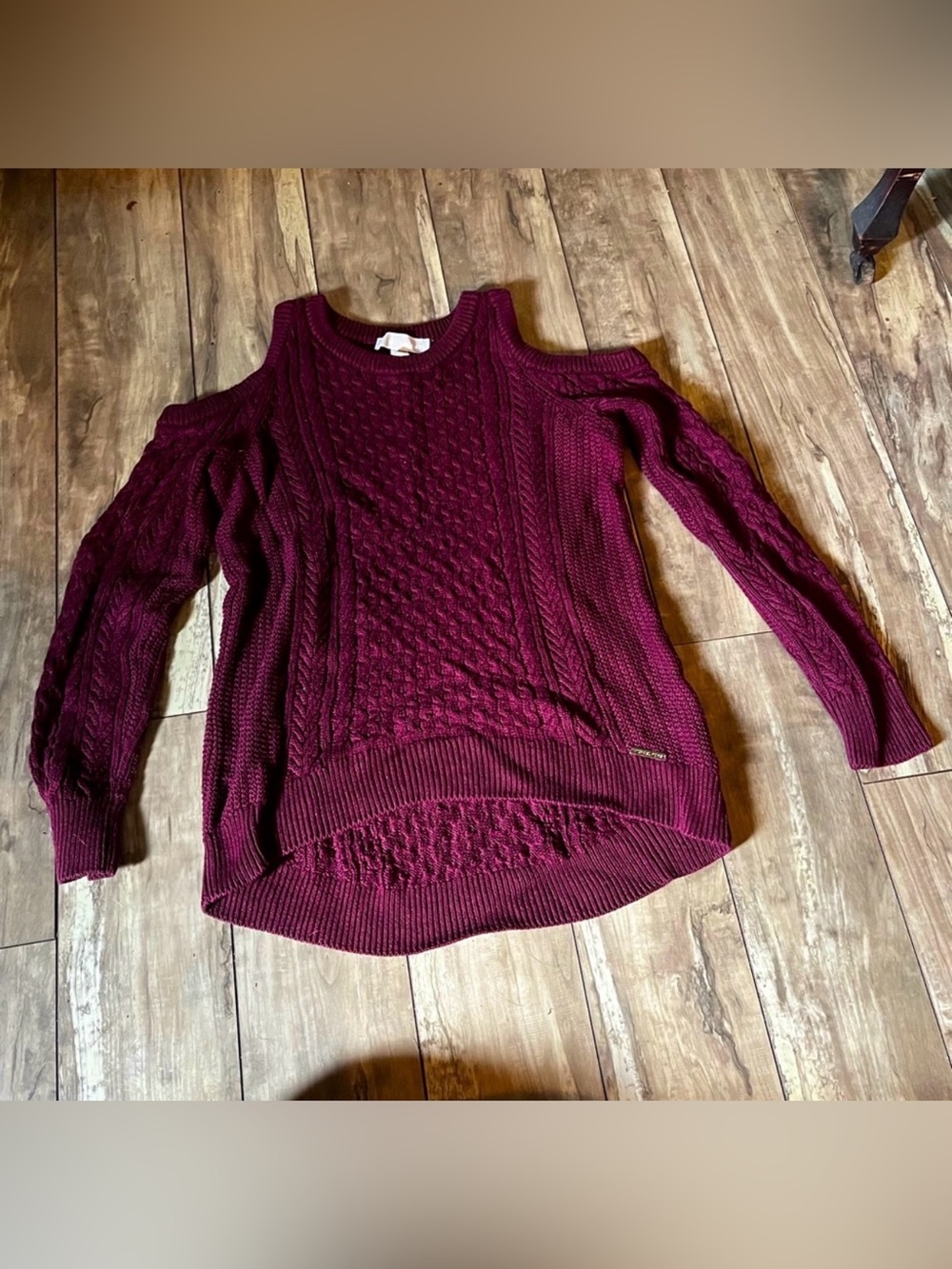 Michael Kors cold-shoulder cable-knit sweater with a high-low hem